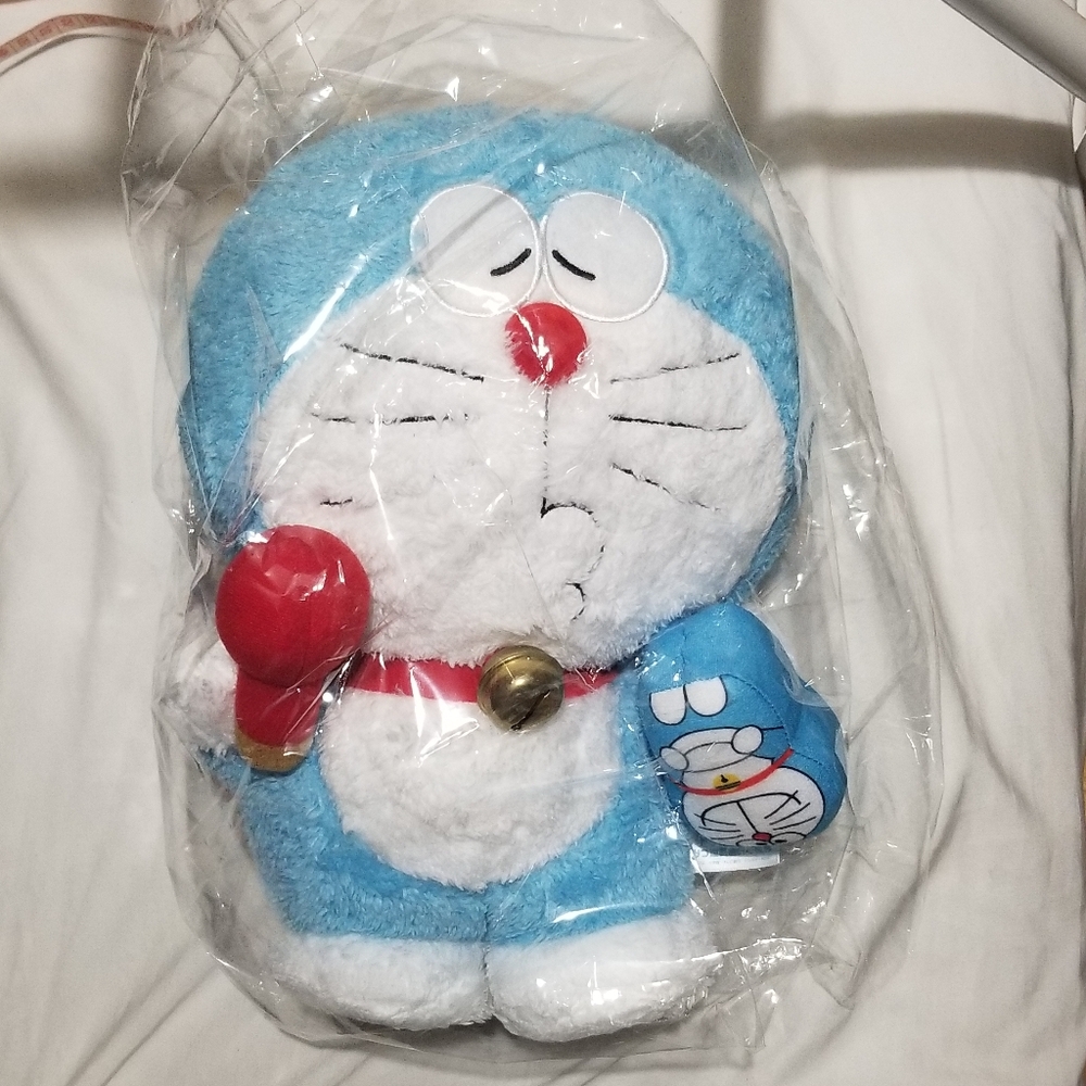 DORAEMON BLUE COLOR Pucker lips  & BELL hoding a Mic and mini DORAEMON  PLUSH